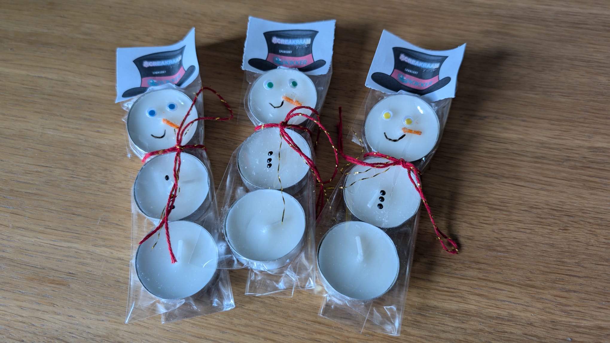 Sneeuwpoppen met een glimlach: Lichtjes voor Stichting Opkikker